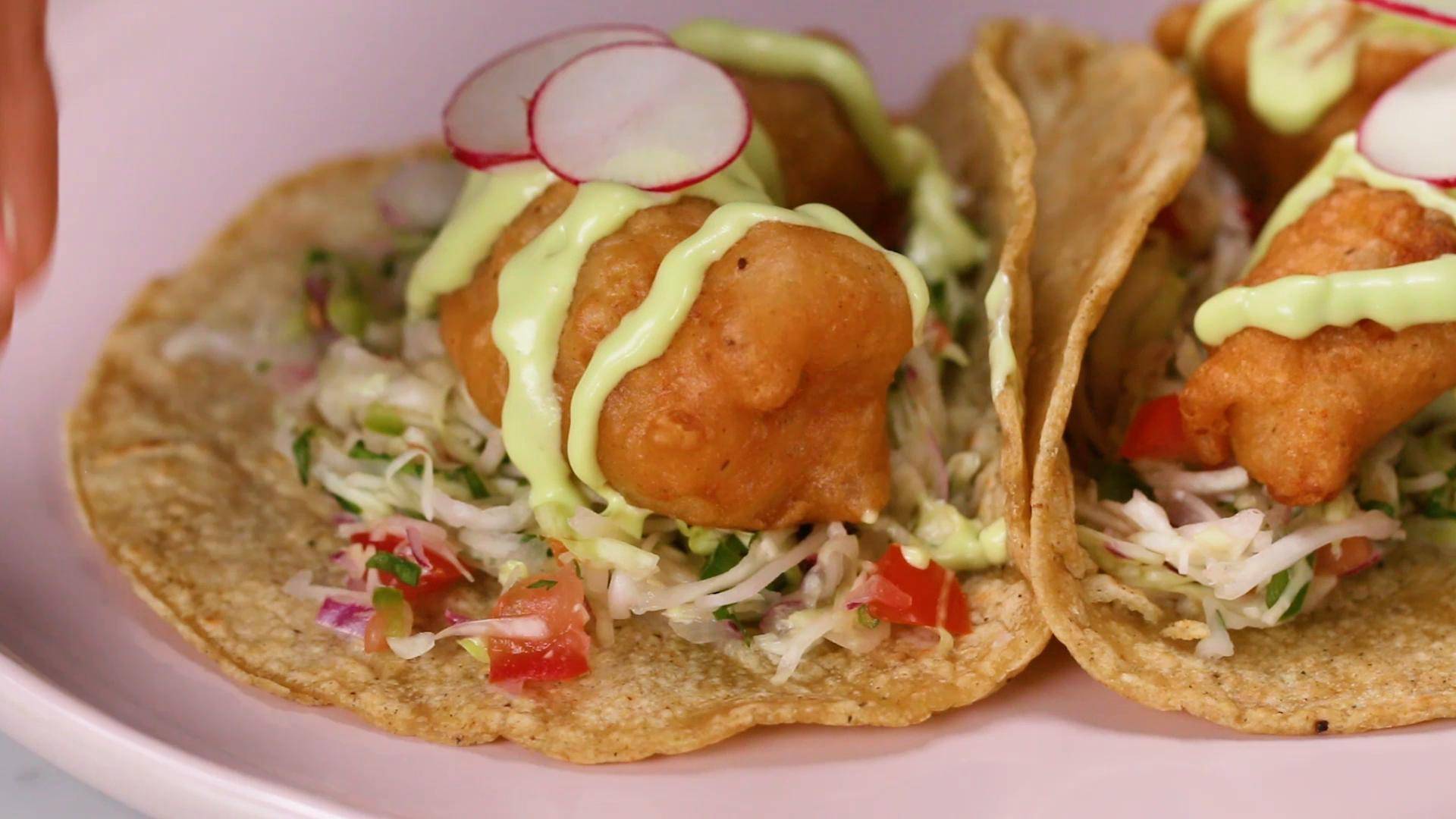 Crispy Fish Tacos with Cabbage Slaw & Avocado Crema