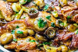 Chicken Thighs and Mushrooms in Butter, Wine, Garlic and Lemon
