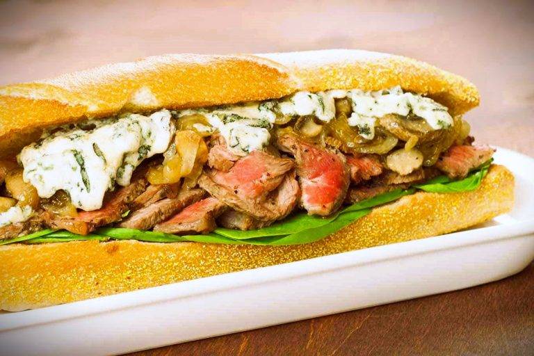 Rib-Eye Steak Sandwich with Blue Cheese and Caramelized Onions and Mushrooms