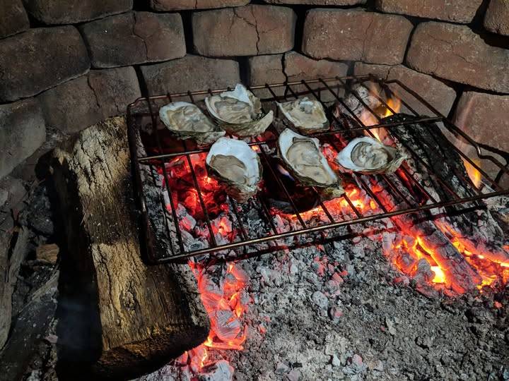 BBQ’d Oysters with a Cheese Topping and Garlic Finishing Butter