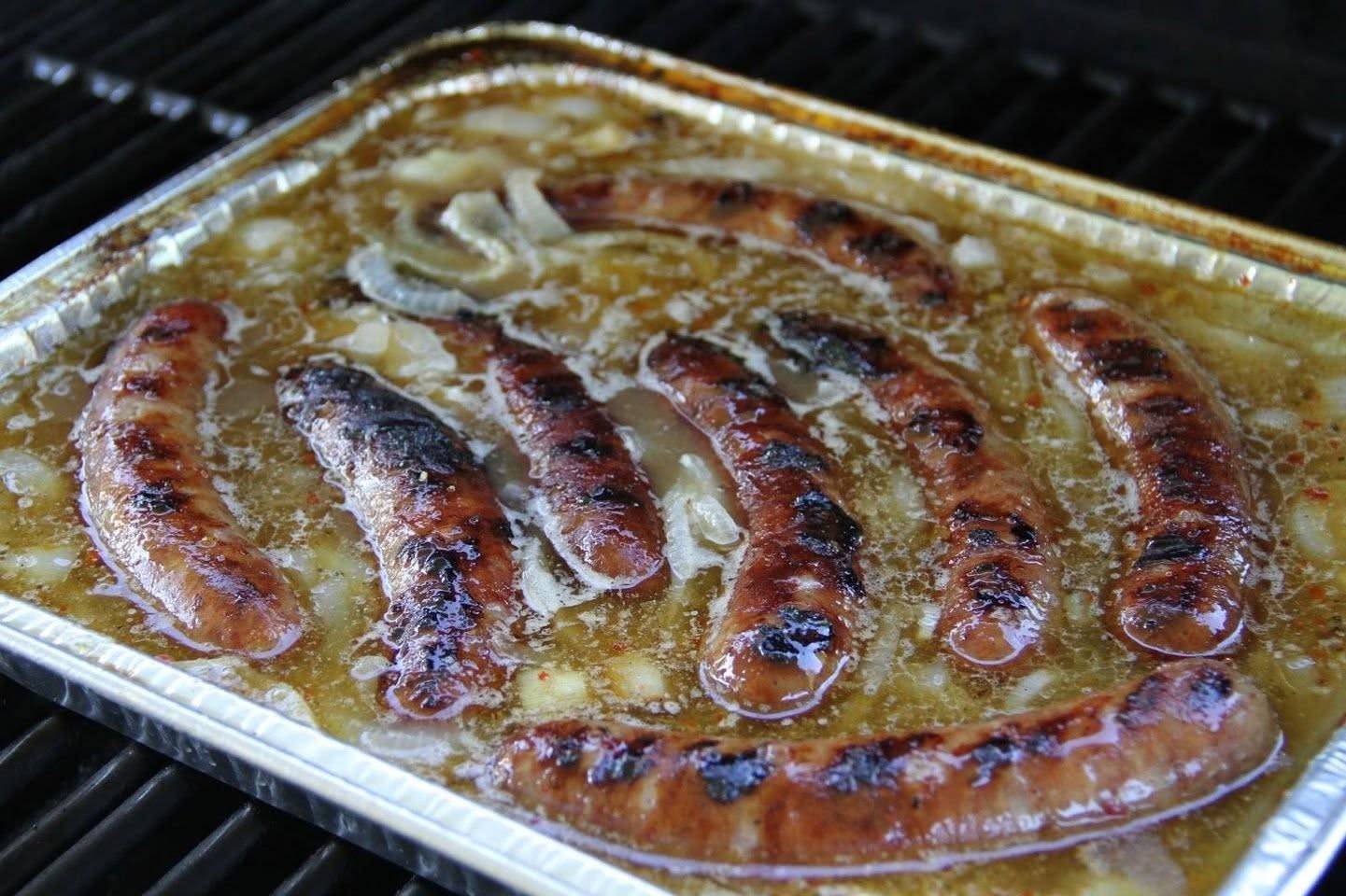Poached & Grilled Dogs & Marinated Cucumber, Onion, and Tomato Salad